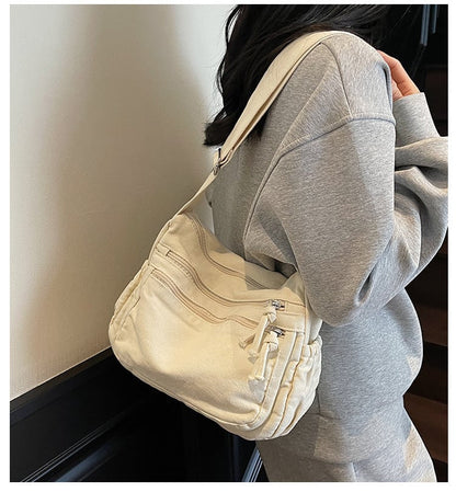 👜✨ Distressed Canvas Messenger Bag – Multi-Zipper Layered Design, Wide Adjustable Strap